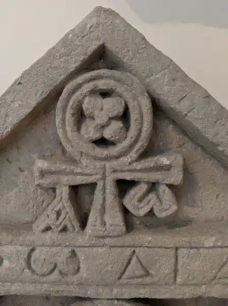 Detail of a tombstone in Egypt, dated 5th Century, Ank symbol with alpha and omega, located in Bode Museum.